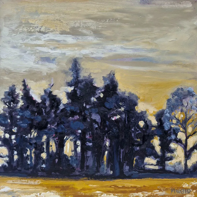 Dark blue silhouettes of tall trees against a yellow and cream sky, with golden ground below